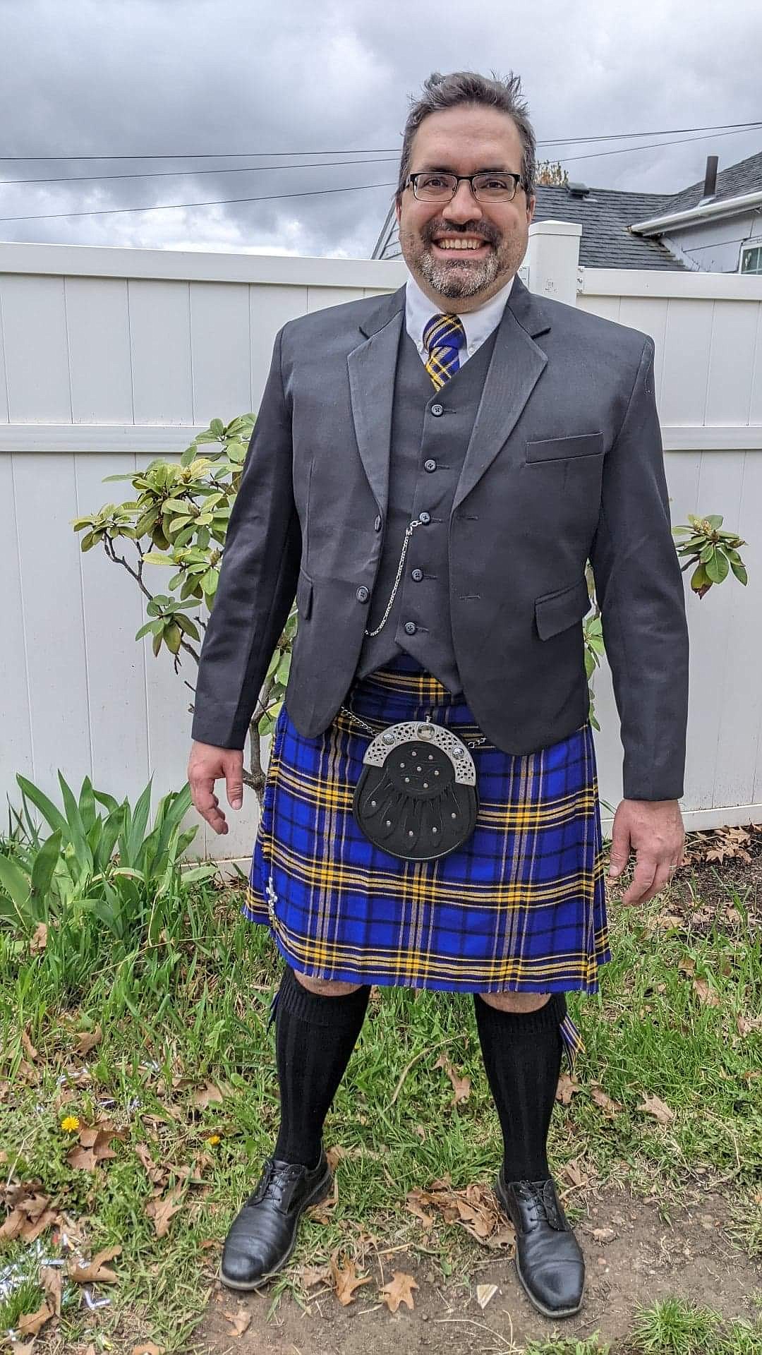 Kelly Clear sports a kilt made of the tartan that he and his wife designed. He first became interested in Scottish culture after watching the movie “Braveheart” but later found out that much of his heritage is Scottish.