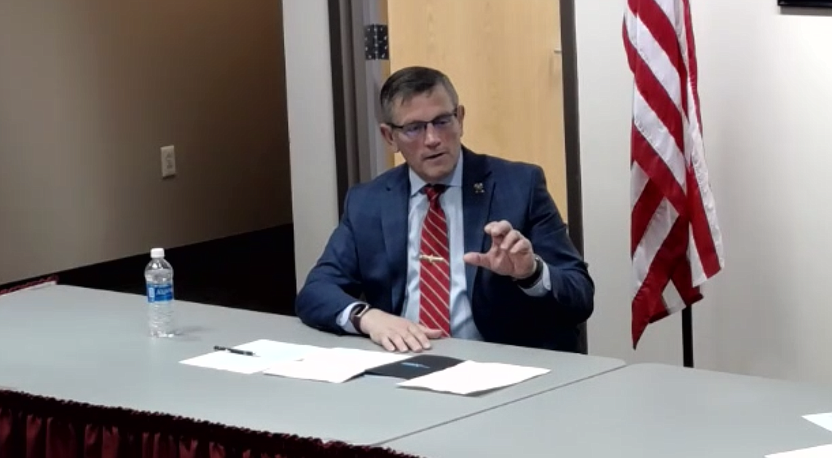 North Idaho College presidential finalist Dr. Nick Swayne answers a question during his interview with the board of trustees Monday evening.