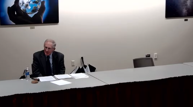 David Wold, chair of the North Idaho College Board of Trustees, is seen here next to seats abruptly vacated by Trustees Todd Banducci and Greg McKenzie during an interview with presidential finalist Dr. Nick Swayne on Monday night. McKenzie eventually returned.