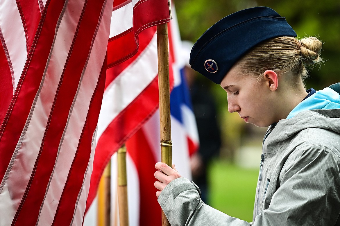 Cadet Chief Master Sergeant Joelle Roberson posts the 15 Star American flag during a Flag Day ceremony at Depot Park in Kalispell on Tuesday, June 14. (Casey Kreider/Daily Inter Lake)