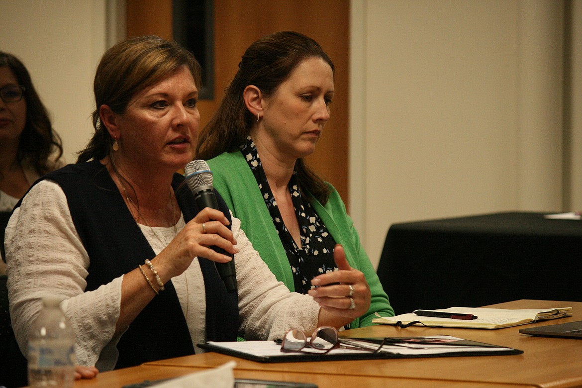 Othello School District officials Amy Parris (left) and Jessica Schenck (right) were among the speakers in a presentation on school security at the Othello School Board meeting Monday.