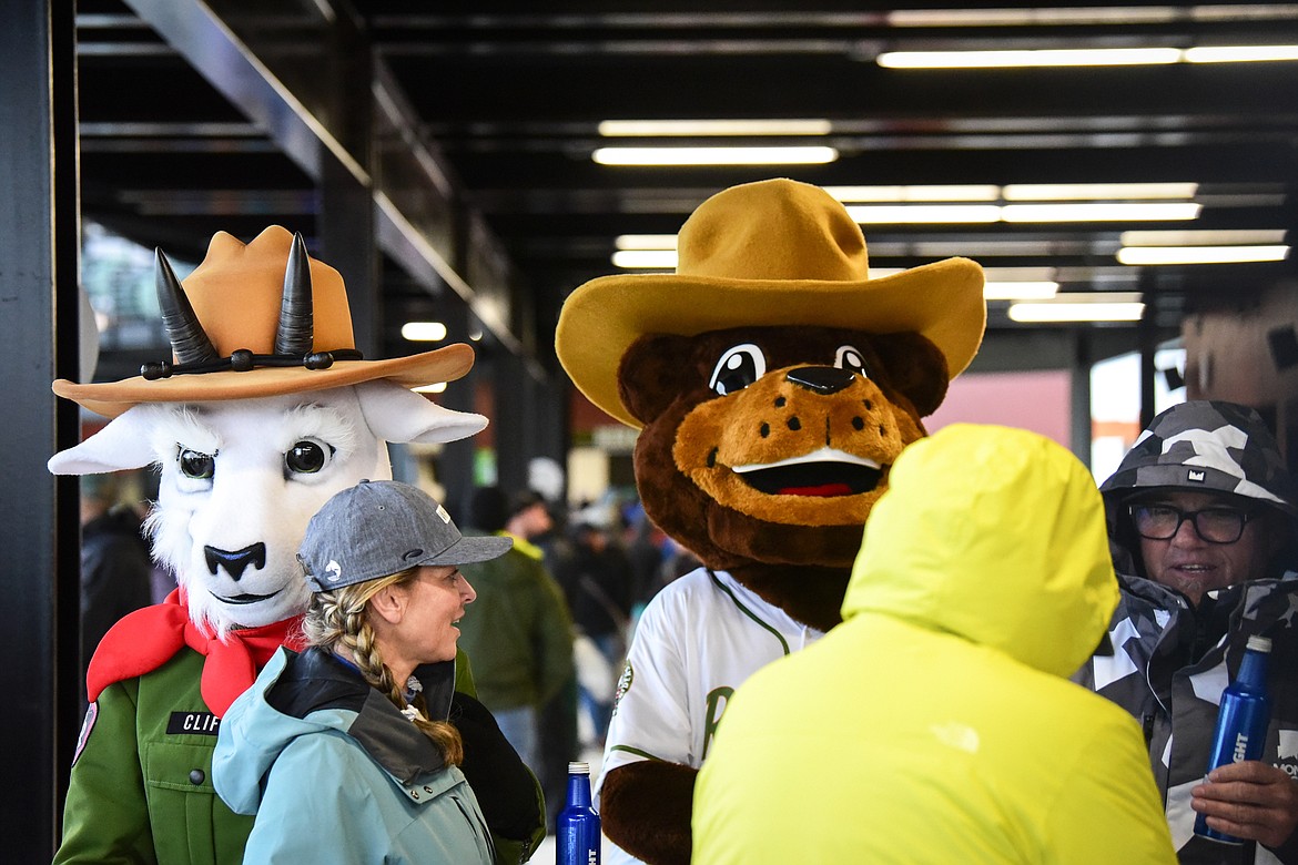 Glacier Range Riders mascots Cliff and Huck greet fans in the concourse before the start of the team's home opener against the Billings Mustangs at Flathead Field on Tuesday, June 14. (Casey Kreider/Daily Inter Lake)