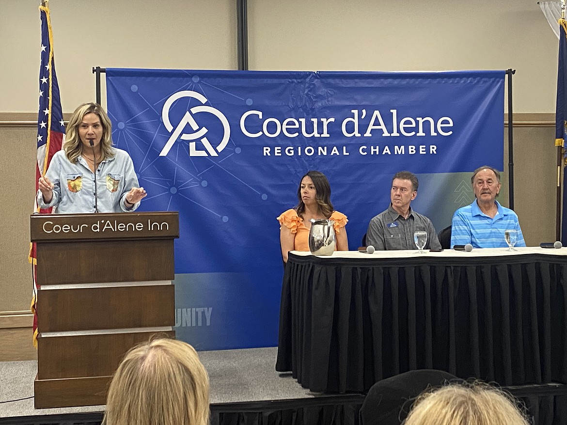 A panel of experts spoke to the Coeur d'Alene Chamber of Commerce Tuesday about the many benefits the North Idaho Centennial Trail brings to the community. From left: Tabitha Kraack, executive director of the North Idaho Centennial Trail Foundation, Danica Gilbert, real estate agent, Mark Tucker, director of the United Way North Idaho and author, trail foundation board member and former Coeur d'Alene Parks director Doug Eastwood.