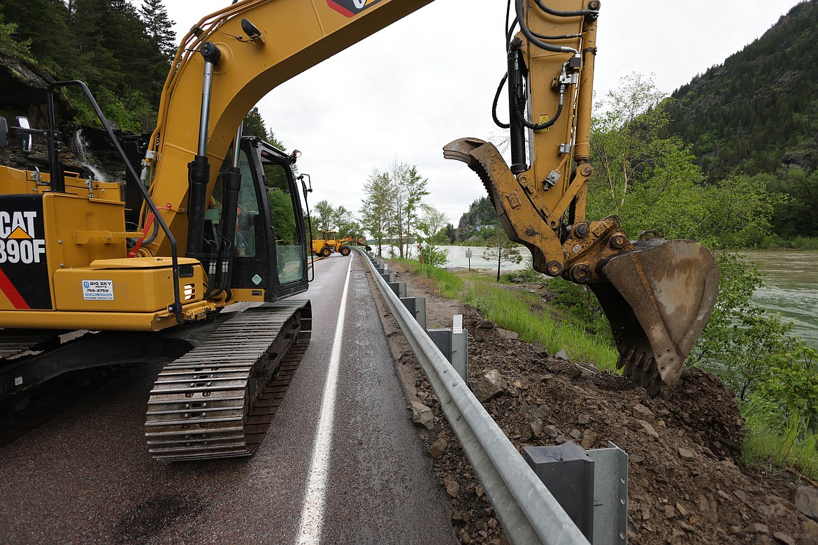 Construction crews reinforce U.S. 2 in Bad Rock Canyon on Wednesday, June 15. (JP Edge/Hungry Horse News)