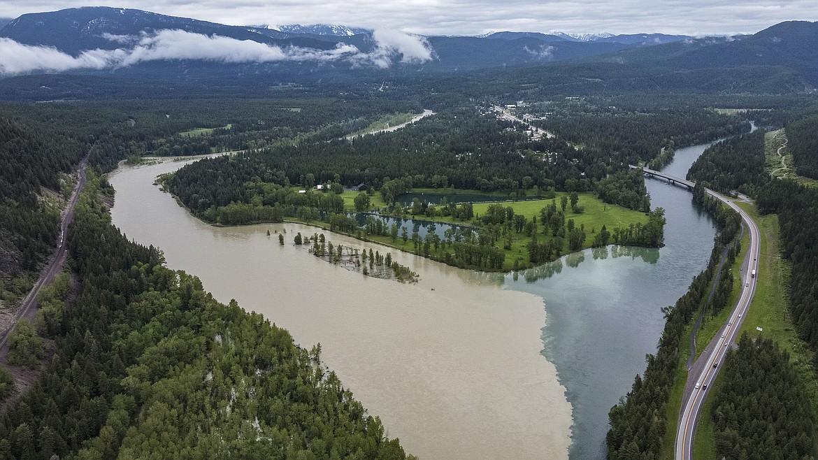 Muddy and clear water meet at the confluence of the South Fork of the Flathead River and the main Flathead River on Wednesday. (JP Edge/Hungry Horse News)