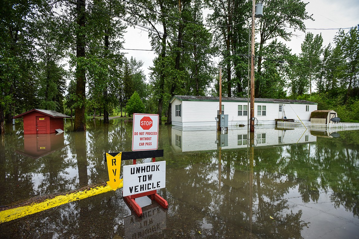 Rising flood waters from the Flathead River are shown at Spruce Park On the River RV Park & Campground in Evergreen on Wednesday, June 15. (Casey Kreider/Daily Inter Lake)