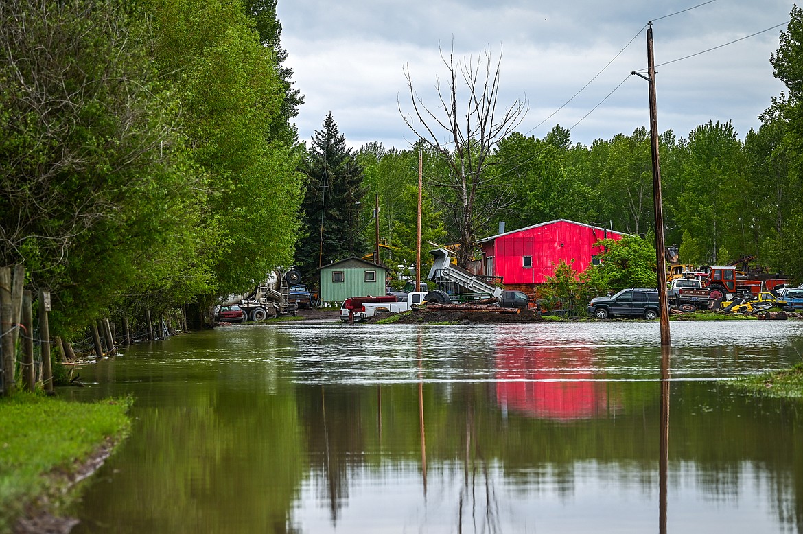 The Flathead River floods a property on Amdahl Lane in Evergreen on Wednesday, June 15. (Casey Kreider/Daily Inter Lake)