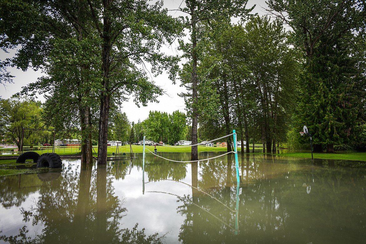 A flooded volleyball court at Spruce Park On the River RV Park & Campground in Evergreen. (Casey Kreider/Daily Inter Lake)