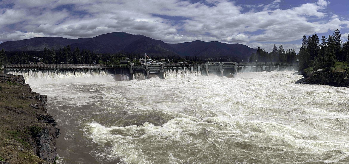 Water flows over the Thompson Falls Dam on Wednesday, June 15. (Tracy Scott/Valley Press)