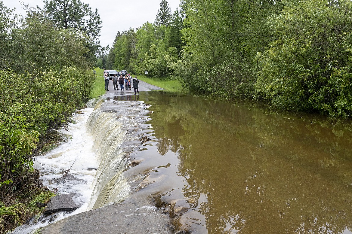 A culvert plugged, flooding and damaging North Hilltop Road . There was concern the culvert could fail entirely, sending a wall of water downstream.