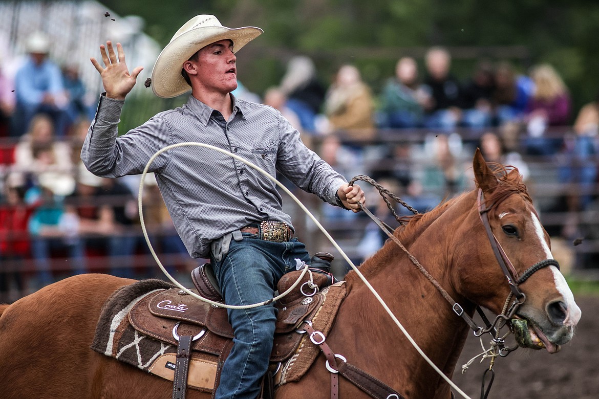 A roper lets go after capturing a steer. (JP Edge photo)