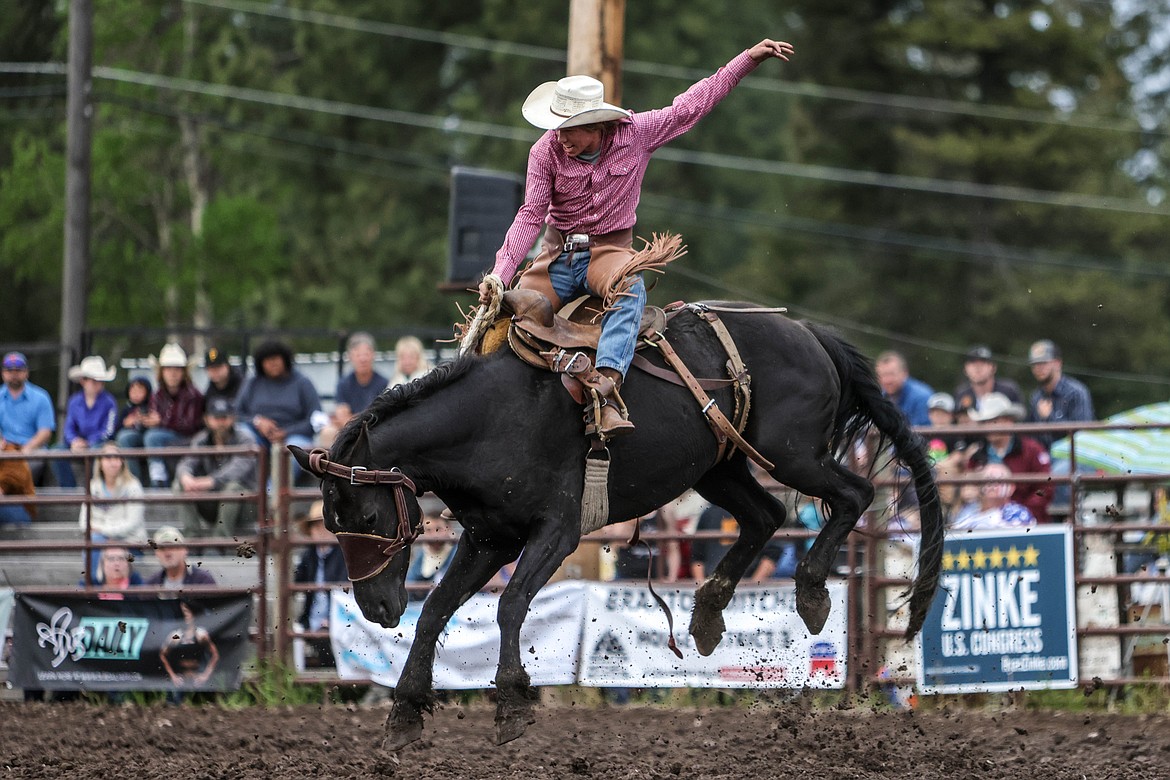 A saddle bronco rider at the Blue Moon Rodeo. (JP Edge photo)