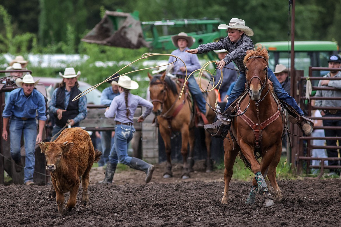 A young roper throws his lasso at a steer at the Blue Moon last Thursday. (JP Edge photo)