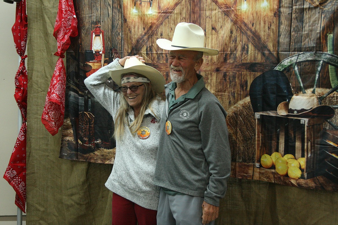 Vicki (right) and Don Anderson don the proper attire for their pictures during the Senior Picnic. “Wild West” was the 2022 theme.