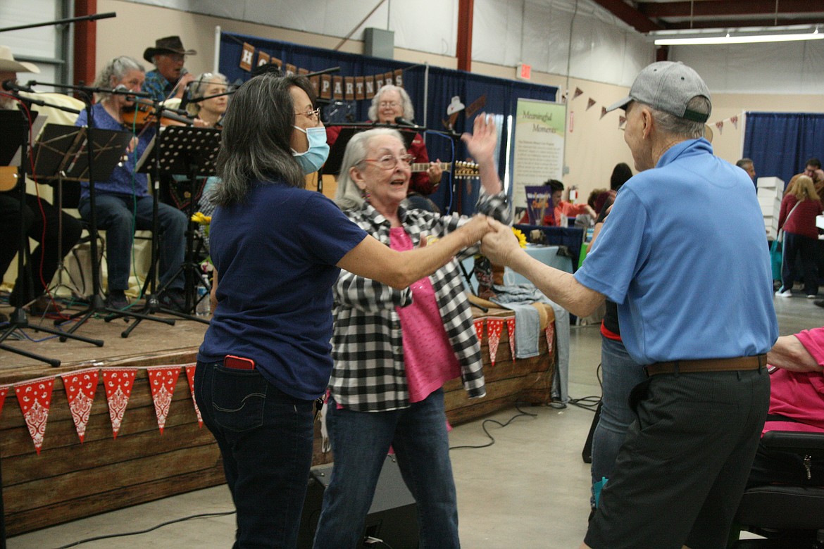 Dancers thoroughly enjoyed themselves during the first in-person Senior Picnic in three years Wednesday at the Grant County Fairgrounds.