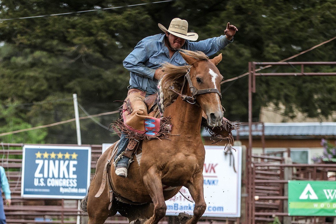 A bronco rider at the Blue Moon Rodeo. (JP Edge photo)
