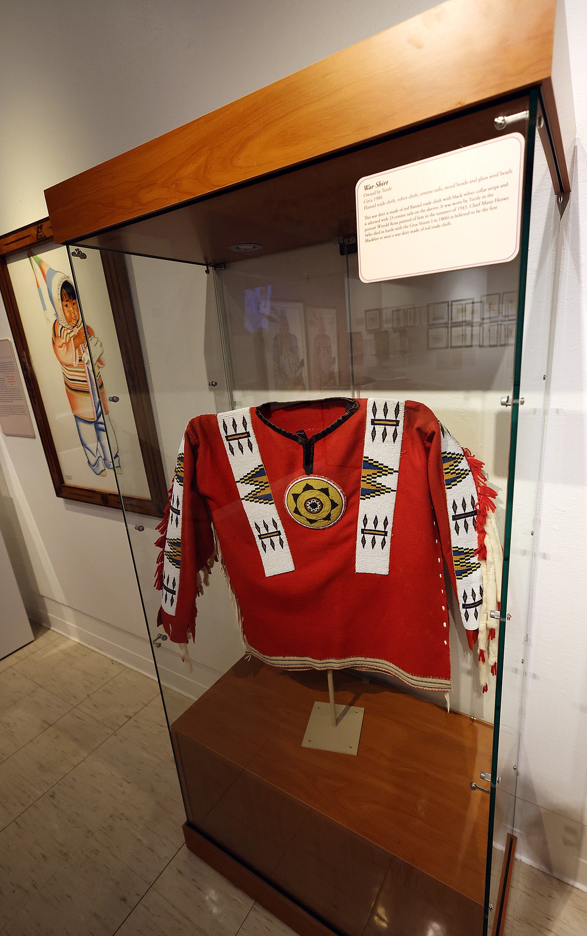 The 1800s red beaded shirt worn by Turtle in one of his Winold Reiss portraits is one of the items connecting the portraits with their subjects as part of the “Connections – the Blackfeet and Winold Reiss” exhibit at the Museum of the Plains Indian in Browning. (Jeremy Weber/Daily Inter Lake)