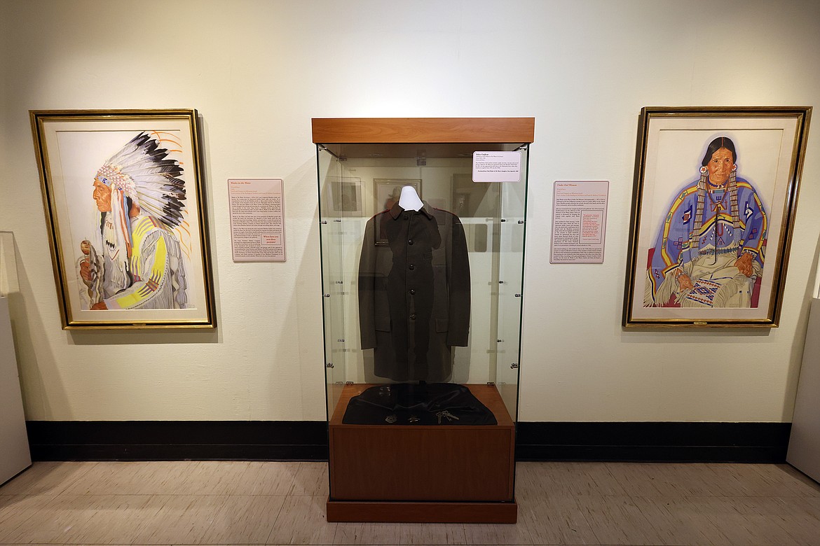 Portraits of Wades in the Water and Julia Wades in the Water, along with Julia's police uniform, are on display as part of the “Connections – the Blackfeet and Winold Reiss” exhibit at the Museum of the Plains Indian in Browning. (Jeremy Weber/Daily Inter Lake)