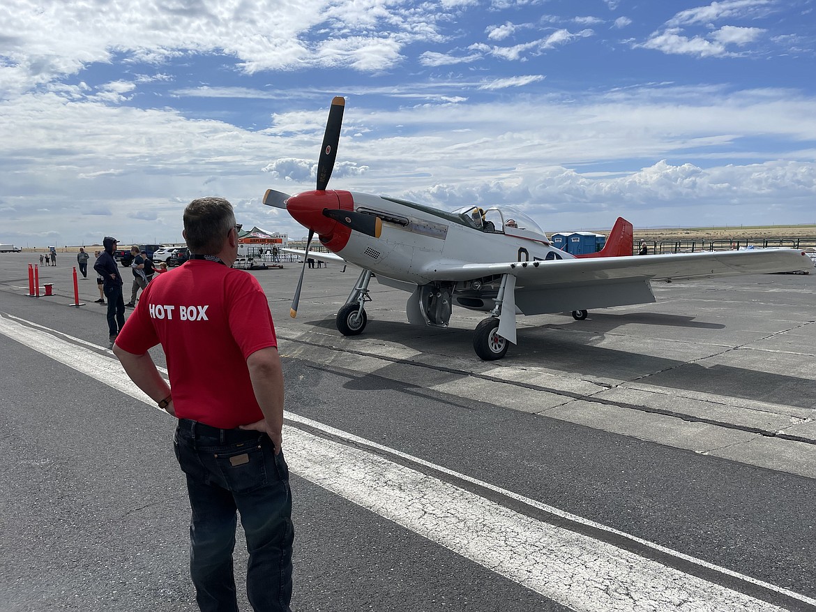 Port of Moses Lake Commissioner Darrin Jackson prepares to guide an old Air Force P-51 Mustang out to fly during the third annual Moses Lake Airshow on Saturday.