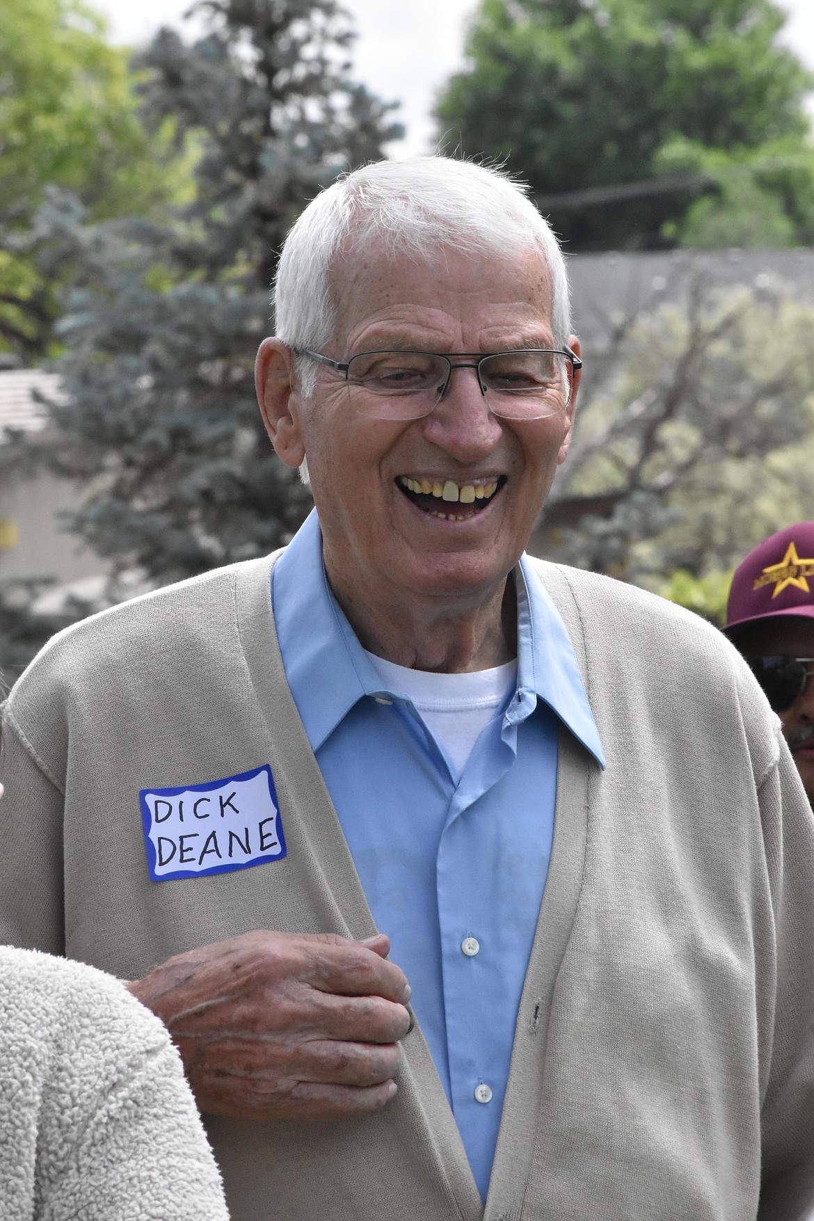 Dick Deane smiles as he speaks with people attending the ceremonial dedication of Dick Deane Family Historical Park on Saturday.