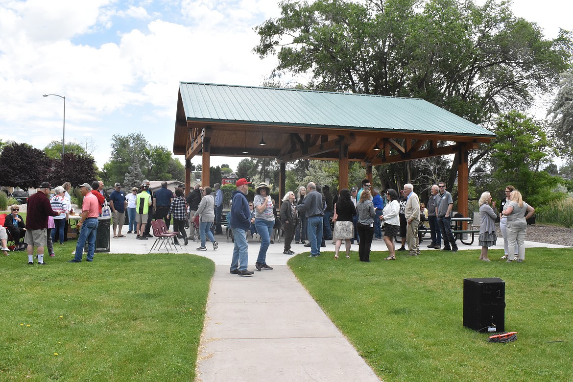 Dozens of people gathered for the dedication of Dick Deane Family Historical Park on Saturday.