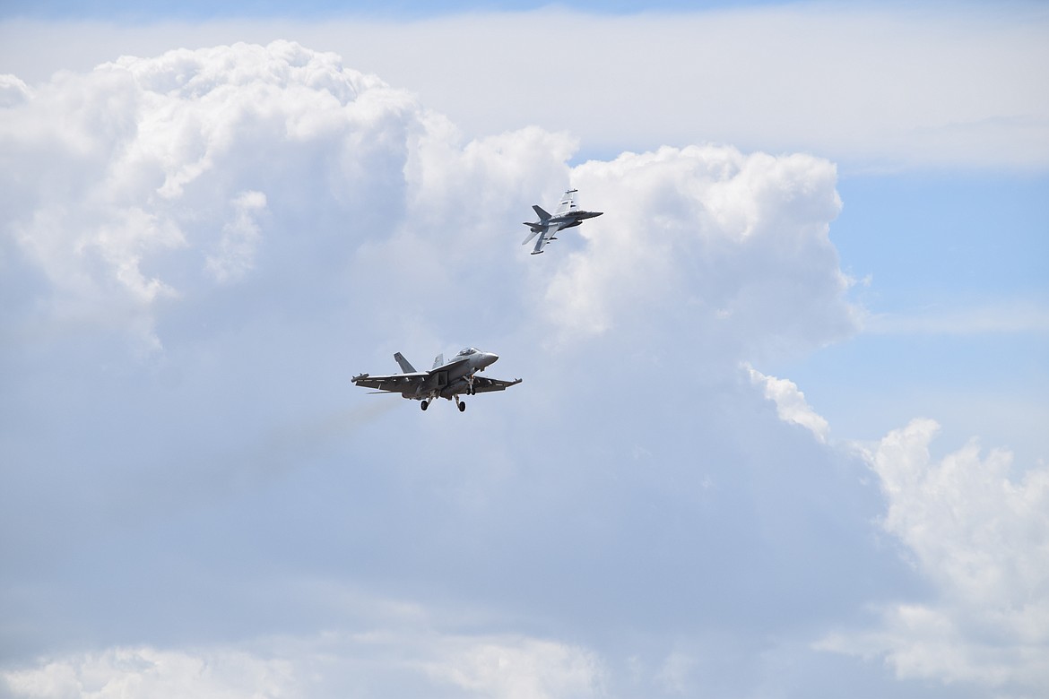 A pair of U.S. Navy A/E-18G Growler electronic warfare aircraft during a demonstration flight at the 2022 Moses Lake Airshow on Saturday.