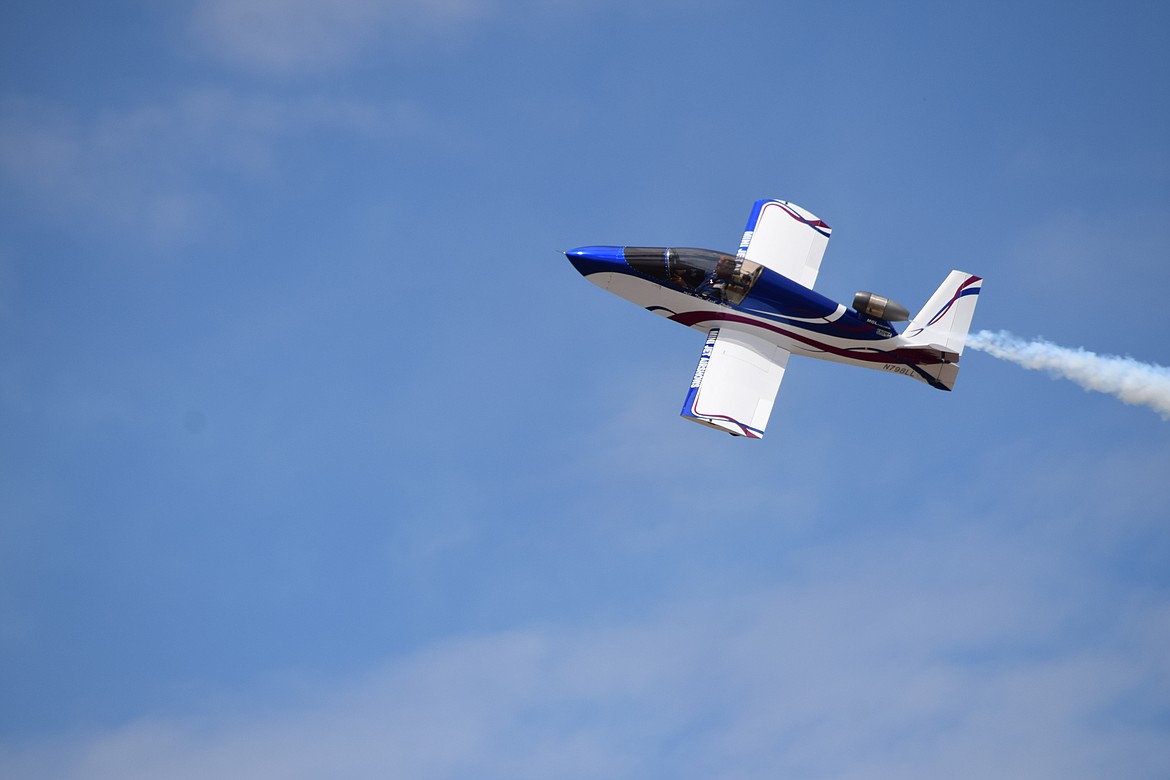 Former USAF fighter pilot Tom Larkin shows off his 500-pound mini-jet — which can reach speeds of 300 miles per hour — over the skies of the Grant County International Airport at the 2022 Moses Lake Airshow on Saturday. Larkin has performed at the airshow every year since it started in 2019.