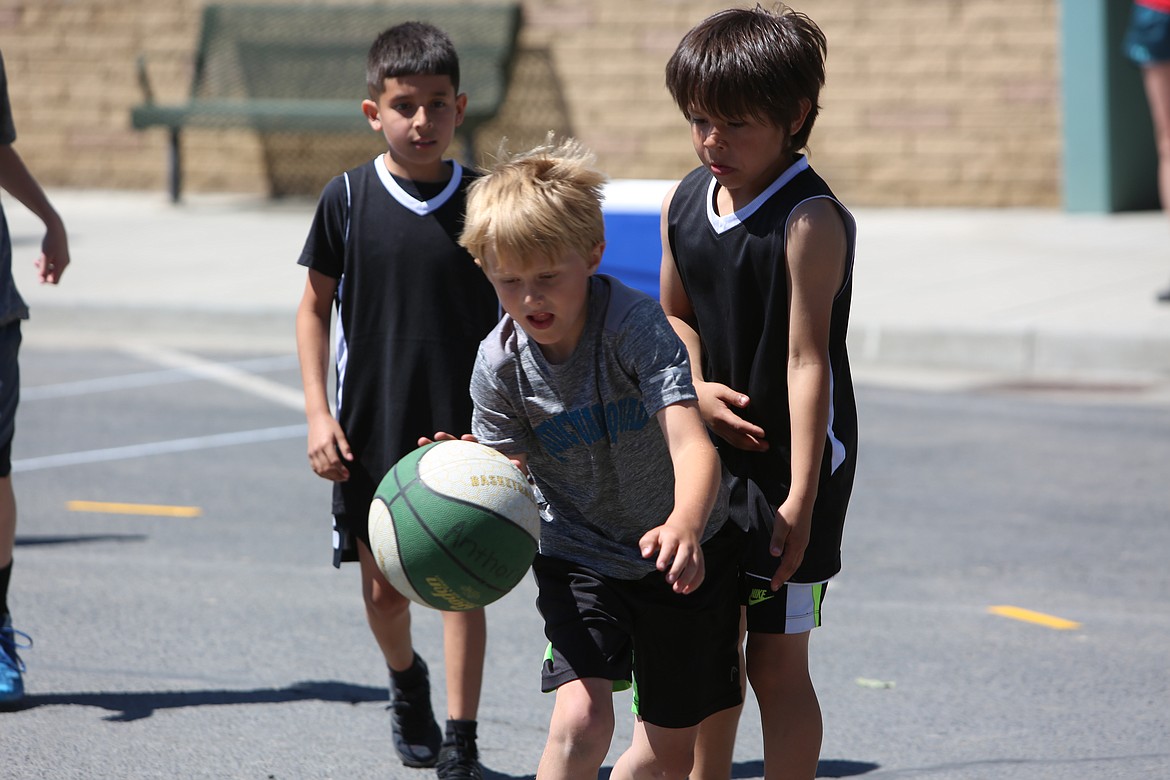 Even the younger competition was harshly competitive, as seen by this young player breaking through a defense.