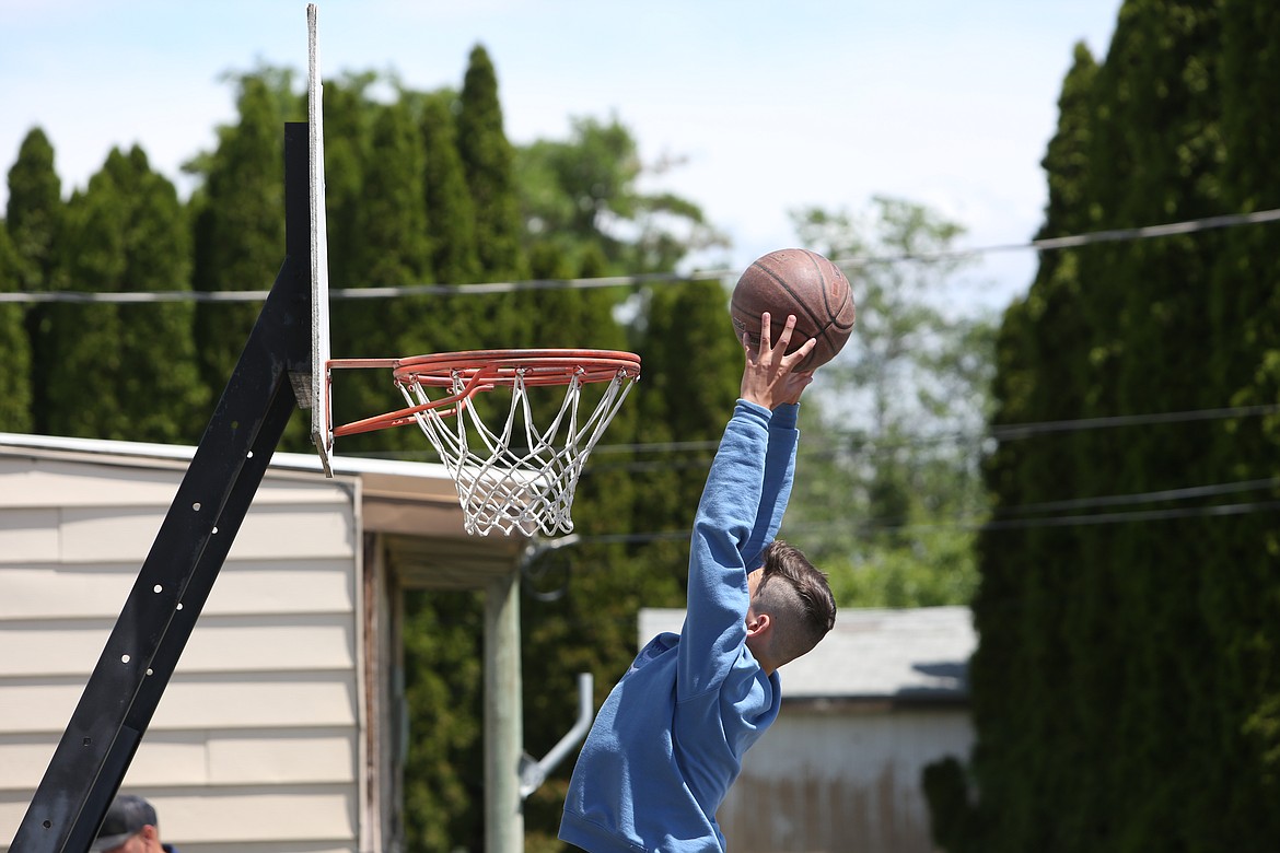 When some courts were open and without games taking place on them, attendees took the opportunity to get some shots up and practice dunking.