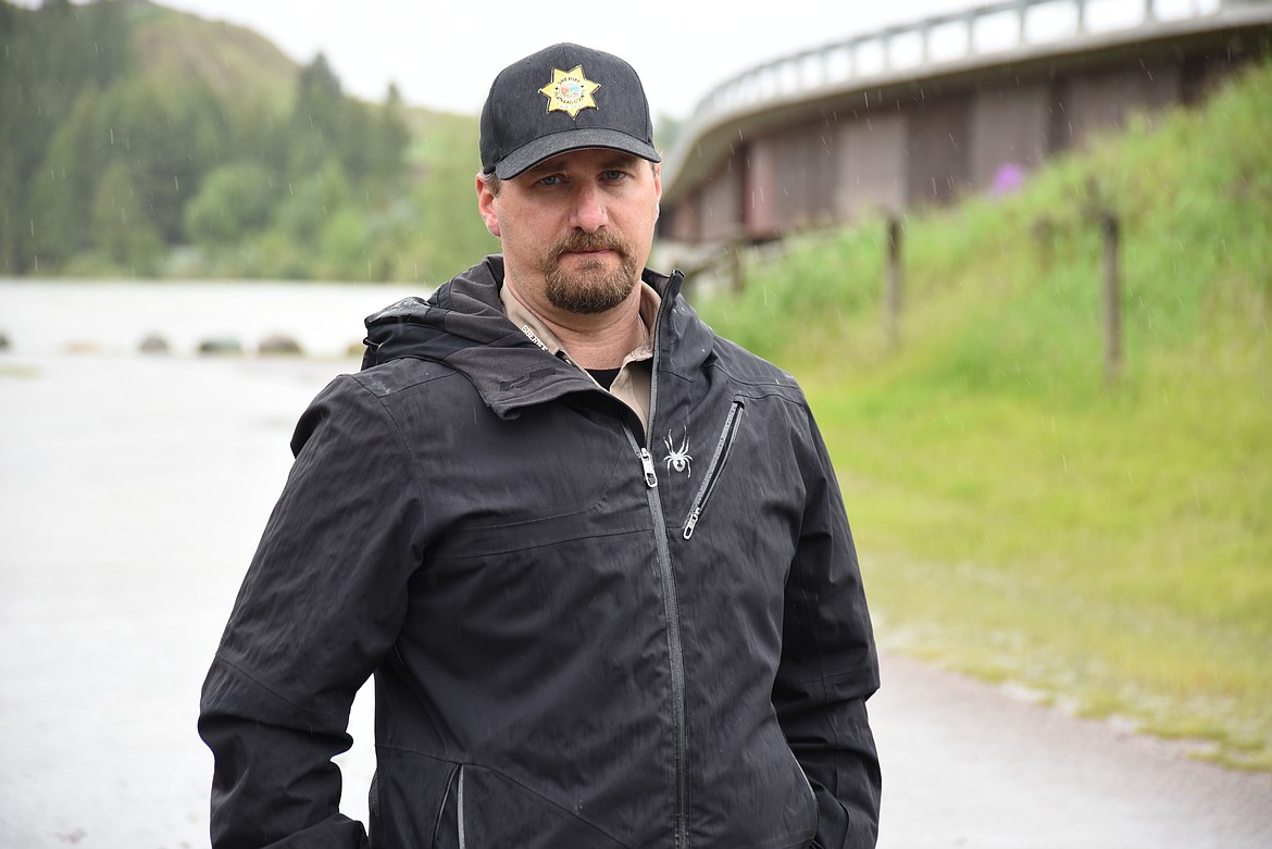 Flathead County Sheriff Brian Heino during a flooding briefing with Gov. Greg Gianforte on Monday, June 20 at the Old Steel Bridge fishing access on the Flathead River in Evergreen. (Matt Baldwin/Daily Inter Lake)