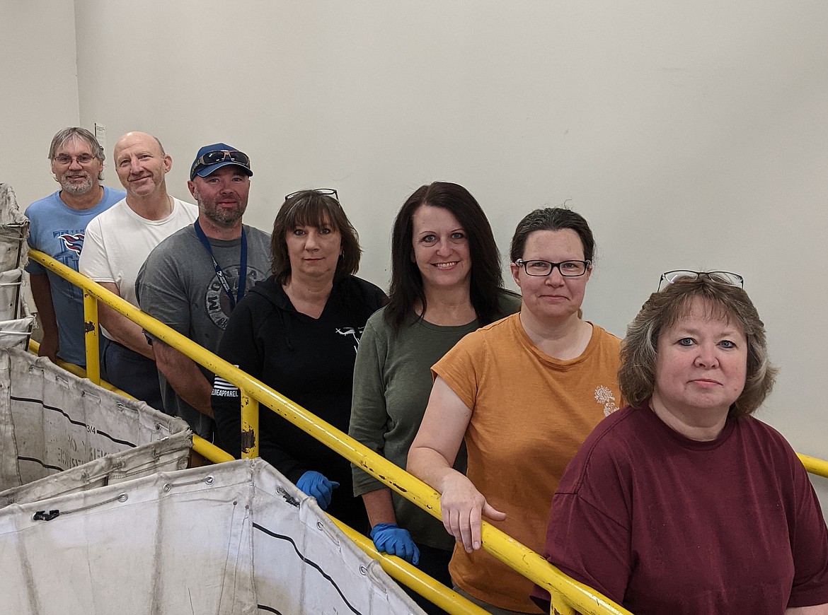 From back to front, are window clerk Rick, city carrier Sam, rural carriers Josh, Terri-Bob, Cindy, Kelly and Teri.