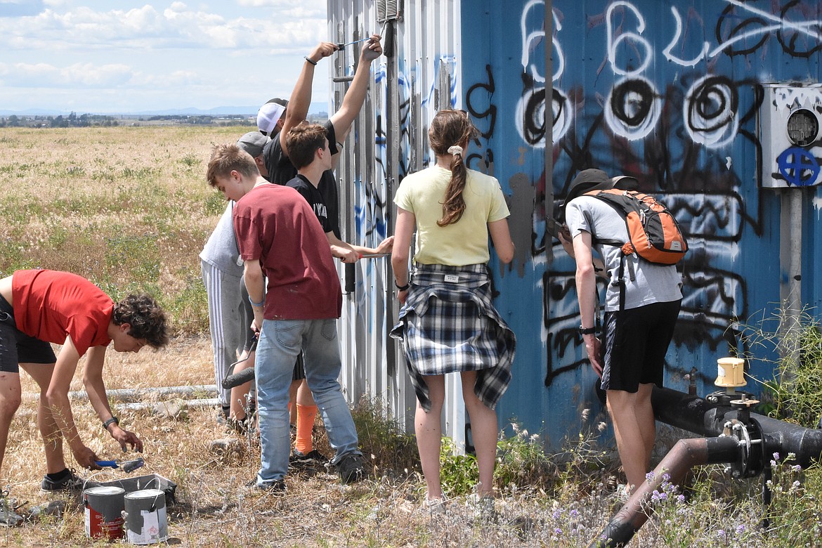 Young volunteers with Light of Larson and Citipoint Church covered 40 different items that were tagged on Saturday.