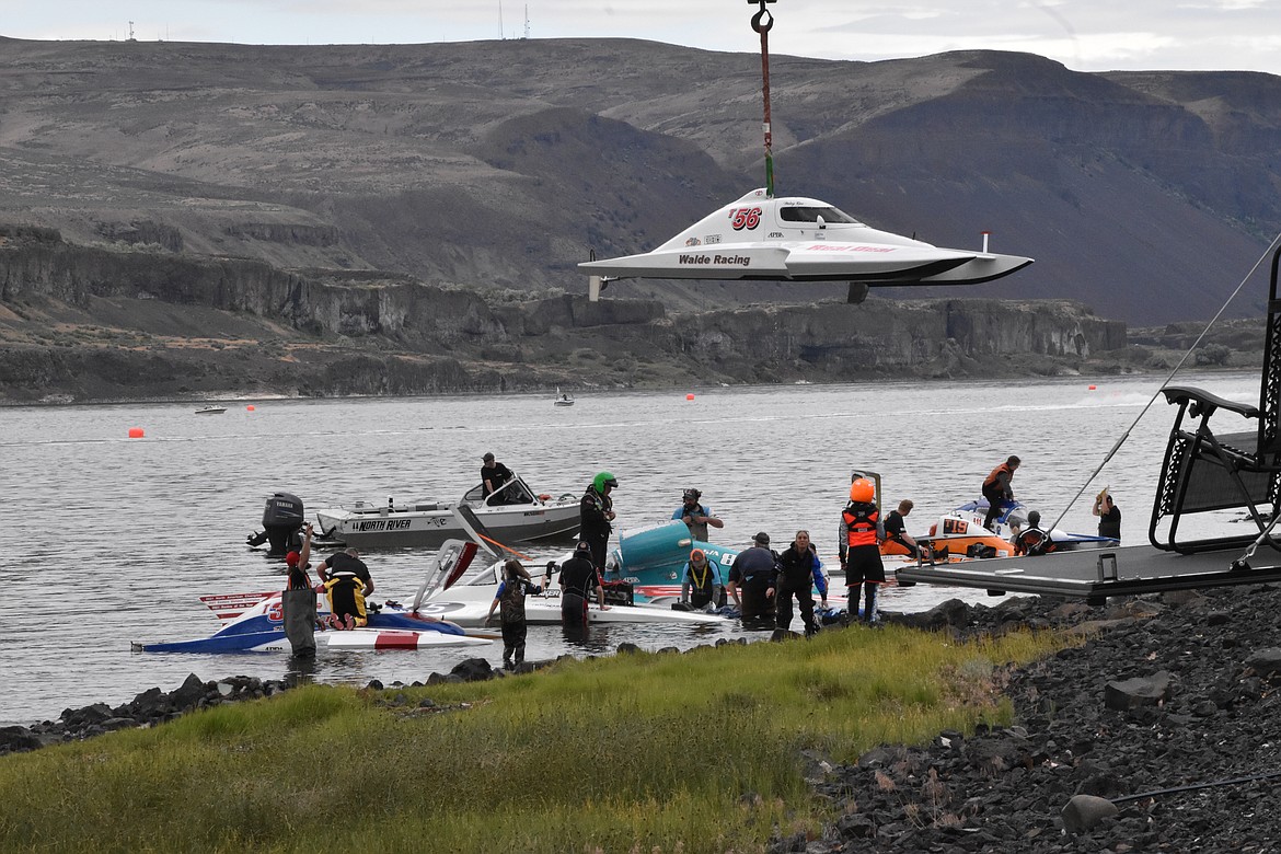 Boats were lifted into the water prior to racing, Race Director Lenny Baker said.