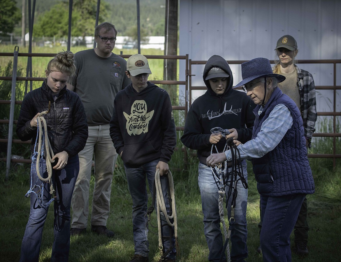 Jean Neneth teaches participants how to tie knows for mule packing trips. (Tracy Scott/Valley Press)