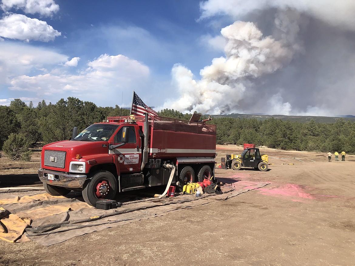 A retardant mixing truck works on the Hermits Peak/Calf Canyon fires in North Central New Mexico last month. (Tracy Scott/Valley Press)