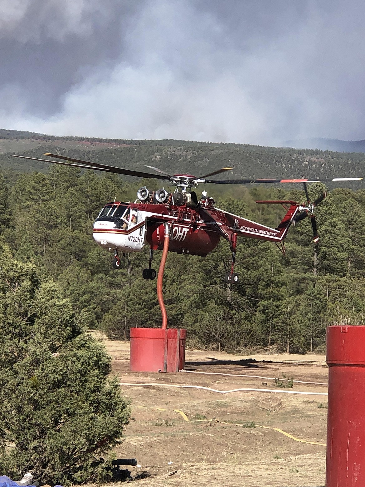 A sky crane fills up on the Hermits Peak/Calf Canyon fires in North Central New Mexico last month. (Tracy Scott/Valley Press)
