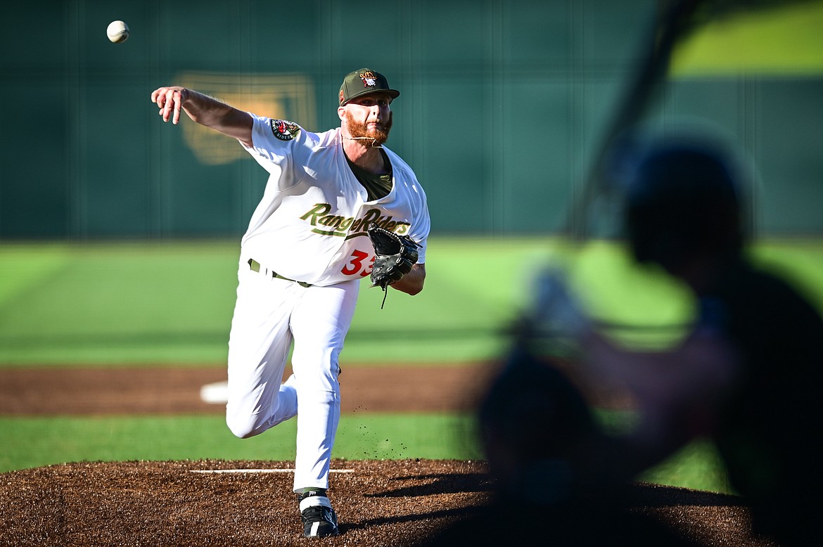 Glacier Range Riders starting pitcher Rob Hamby (33) delivers in the first inning against the Great Falls Voyagers at Flathead Field on Tuesday, June 21. (Casey Kreider/Daily Inter Lake)