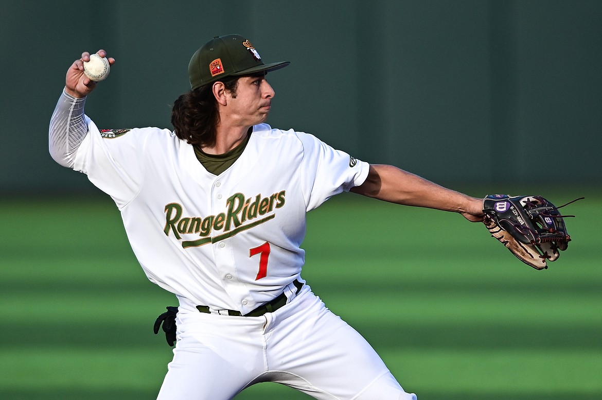 Glacier Range Riders shortstop Austin McNicholas (7) fires to first after fielding a ground ball against the Great Falls Voyagers at Flathead Field on Tuesday, June 21. (Casey Kreider/Daily Inter Lake)