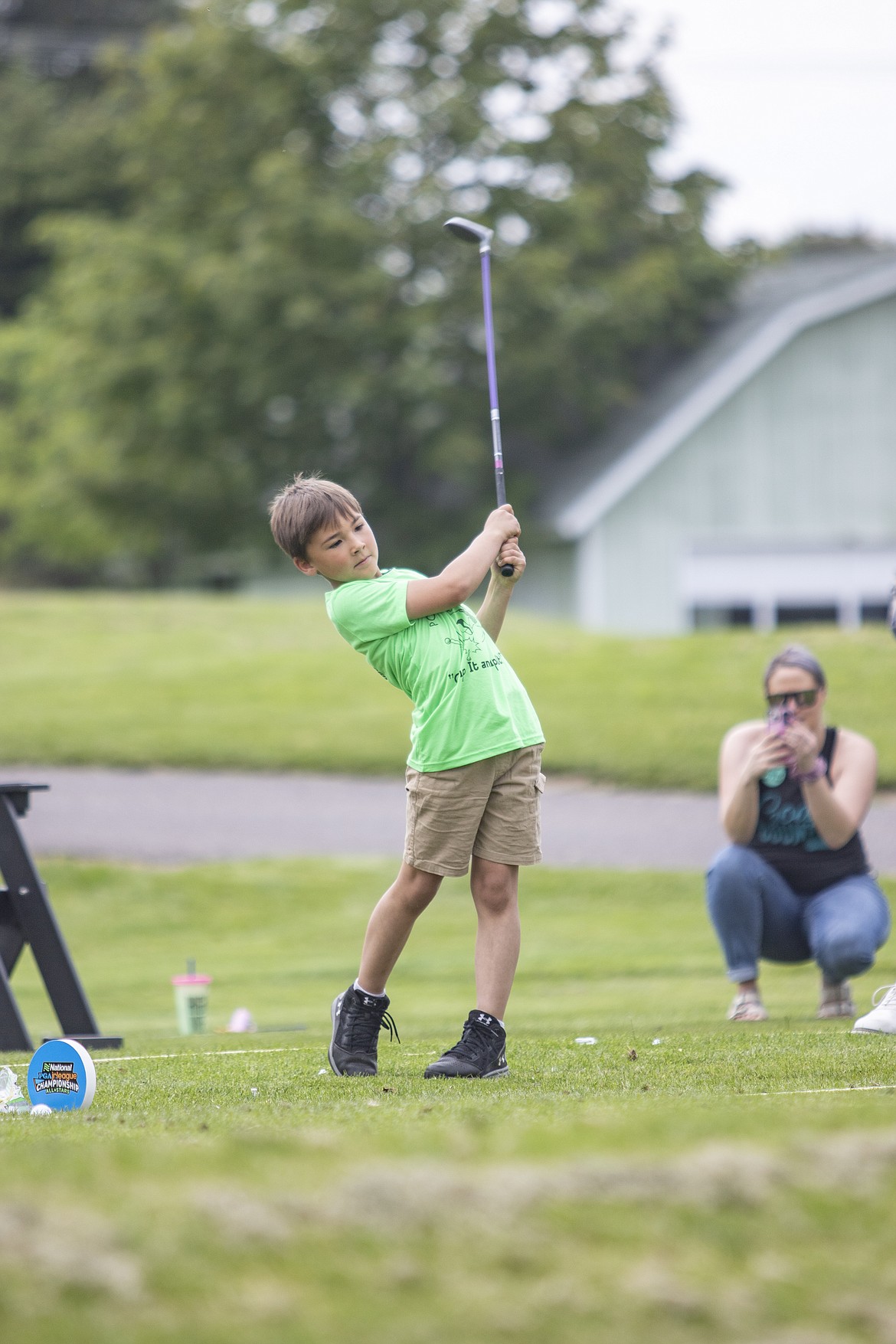 Noah Valentine takes a big swing during the Junior Camp Pitch, Putt, and Drive Competition held at the Polson Bay Golf Course on Friday.