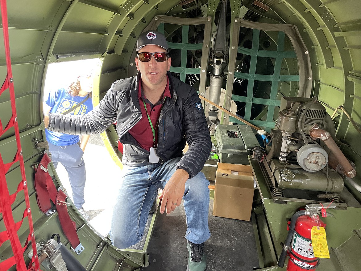 Shawn Mulligan inside the B-17 Flying Fortress “Ye Olde Pub” shows just how cramped the quarters on the plane actually are. A typical B-17 flew a combat mission with a crew of 8-10, Mulligan said — a pilot, co-pilot, navigator, bombardier, and several gunners.