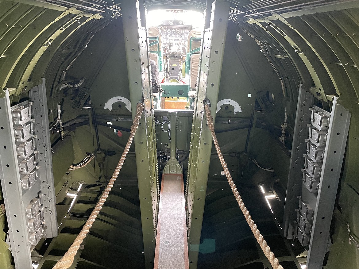 A view of the cockpit of the B-17 Flying Fortress “Ye Olde Pub” through the bomb bay. Pilot Shawn Mulligan said crews would often spend 10 hours flying combat missions in the plane, frequently at high altitude without cabin pressurization or heat, and were required to wear oxygen masks and even heated suits.