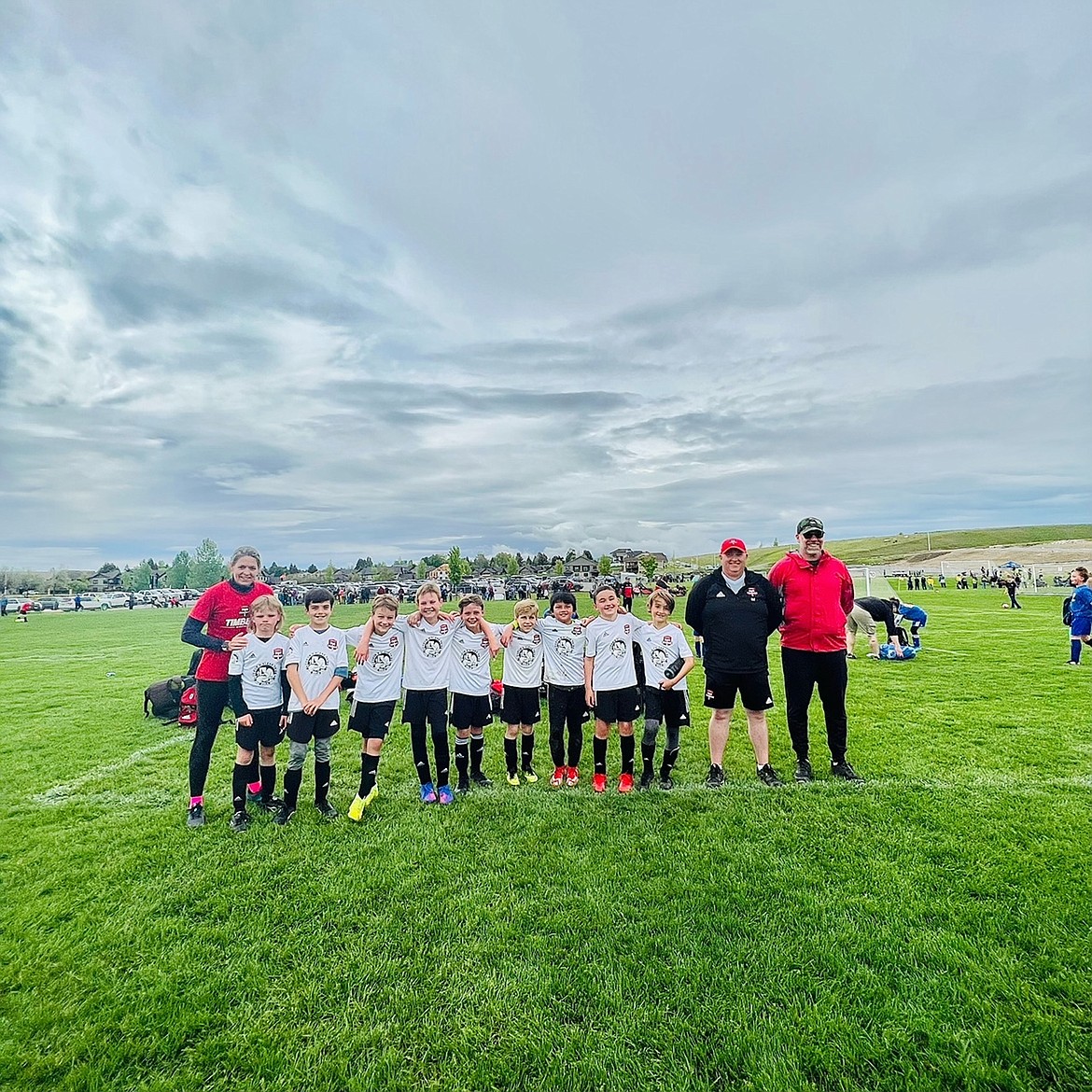 Courtesy photo
The Timbers North FC 2012 Boys Yellow soccer team recently competed at the 3 Blind Refs Tournament in Kalispell, Mont. From left are coach Nancy Mittelstadt, Mitt Larson, Henry Bowlby, Mac Roberts, Colin Hutchins, Jimmy Greene, Ryland Howard, Ethan Mariano, Brendan Butler, Camden Nelson, coach Ian McKenna and coach Robin Bundy.