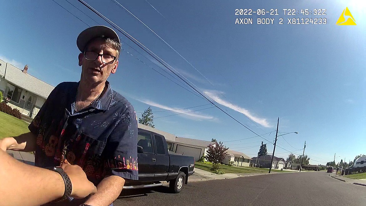 Bodycam images from the Moses Lake Police Department show Eric Deane, 58, of Moses Lake during his arrest Tuesday in connection with a two-week investigation into suspected drug sales at his home.