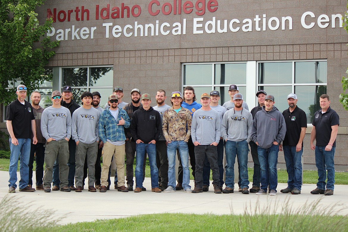 Graduates of the first VOLTA lineworkers’ class held at the North Idaho College Parker Technical Center pose before receiving their certificates June 16. Many of the 18 graduates will now sign on with different power companies as apprentices.