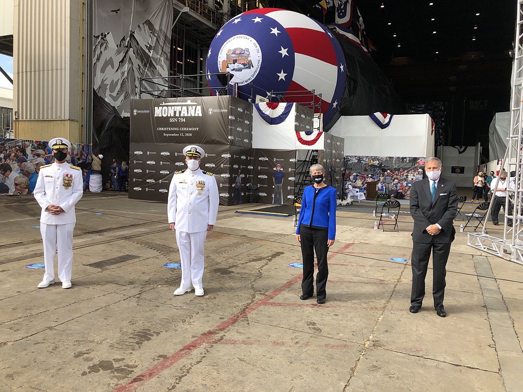 Former Under Secretary of the Navy (Acting) Gregory J. Slavonic (right) stands alongside fellow participants during the christening of the future USS Montana (SSN 794) on Sept. 12, 2020, in Newport News, Virginia. The Navy christened one of its newest attack submarine during a ceremony at Newport News Shipbuilding, a division of Huntington Ingalls Industries. (U.S. Navy photo by Lt. Ashley E. Nekoui/Released)