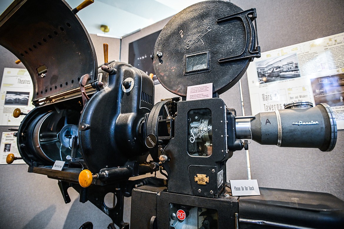 A 35mm film projector from 1939 that was originally used in the Orpheum Theater and displayed at Gateway Cinema until 2007. The projector is one of hundreds of historical artifacts on display at the "Kalispell: Montana's Eden" exhibit at the Northwest Montana History Museum in Kalispell on Thursday, June 23. (Casey Kreider/Daily Inter Lake)