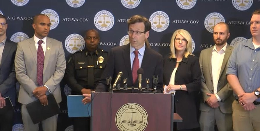 Washington Attorney General Bob Ferguson speaks during a Thursday press conference where a task force aimed at reducing retail crimes such as shoplifting was announced.