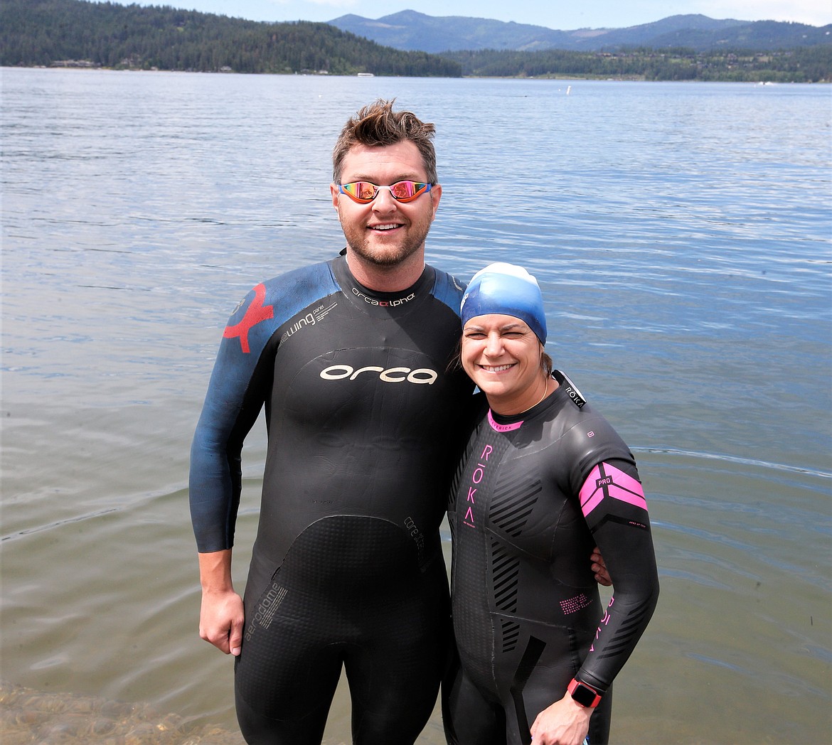 Greg Lowhorn and sister Christina Lowhorn get ready to swim in Lake Coeur d'Alene on Friday. Both are registered for Sunday's Ironman 70.3 Coeur d'Alene.