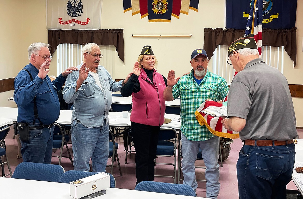 Joe English, Idaho Veterans of Foreign Wars District 1 VFW commander, swears in the local VFW's new officers for the coming year. From left, are 
Ken Keeler, quartermaster/adjutant; Larry Pederson, junior vice commander; Julie Washburn, senior vice commander, Ken Hunt, VFW post commander, and English.