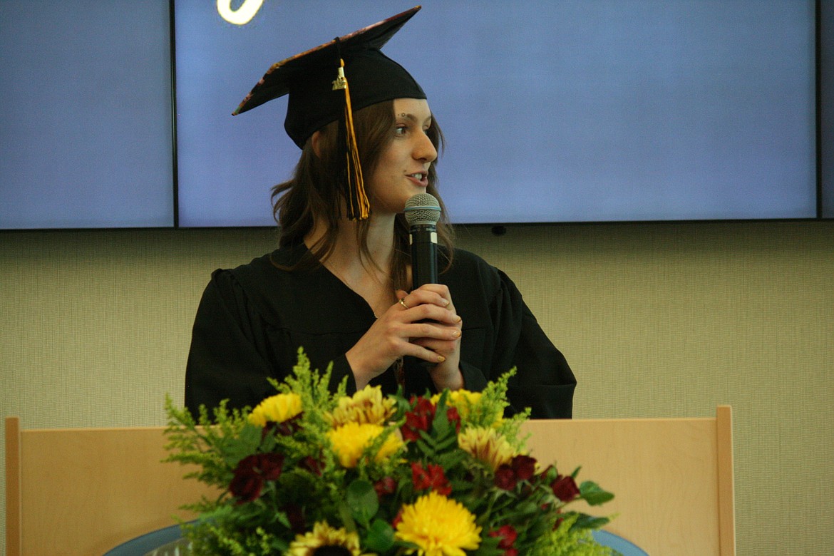 Student speaker Morgan Evans talks to her fellow graduates during the Open Doors Ceremony Thursday.